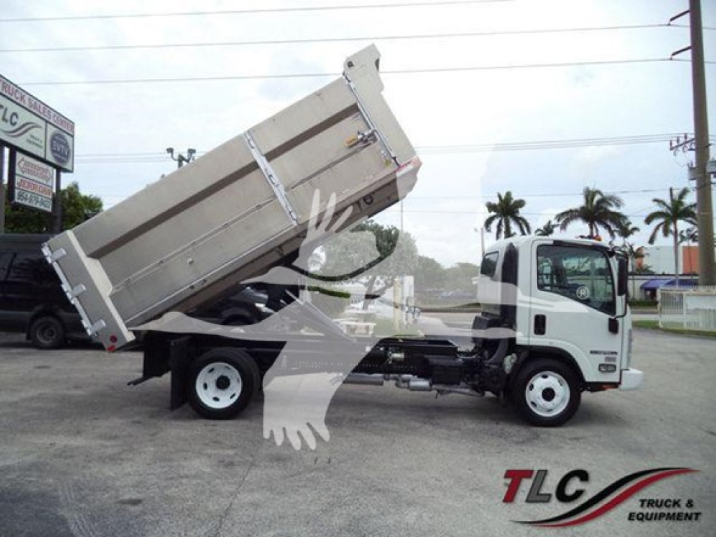 Isuzu NPR-HD dump truck in profile view with bed raised, showing hydraulic lift and chassis, front cab, and rear wheels.