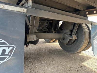 Trailer undercarriage of a 2022 Utility 3000R reefer trailer showing axle assembly, suspension, and wheels.