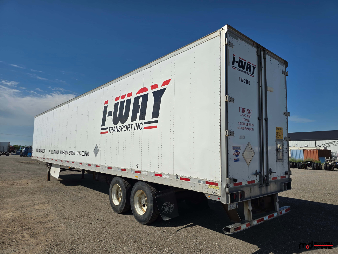 Semi trailer showing Li-Way Transport Inc. 53' dry van trailer with tandem wheels and rear doors.