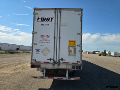Rear view of a 2020 Utility 4000D-X 53' tandem dry van trailer showing i-way Transport label, registration numbers, and warning decals.
