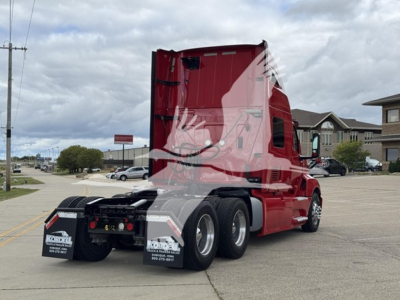 Truck rear/side view of a red 2019 International LT sleeper with dual rear axles, mud flaps, and exhaust visible; includes stock number 2508112 and VIN 3HSDZAPR4KN086464 on listing.