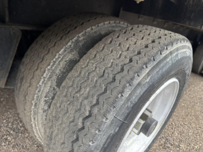 Great Dane steel spread air drop deck trailer wheel showing dual-tire configuration and rim