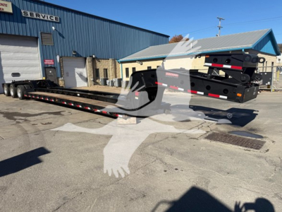 2026 Fontaine Magnitude 60Hd MDSR lowboy trailer chassis and gooseneck in a yard with a service building in background; new unit with VIN 13NE56307T35A6280 on stock T35A6280.