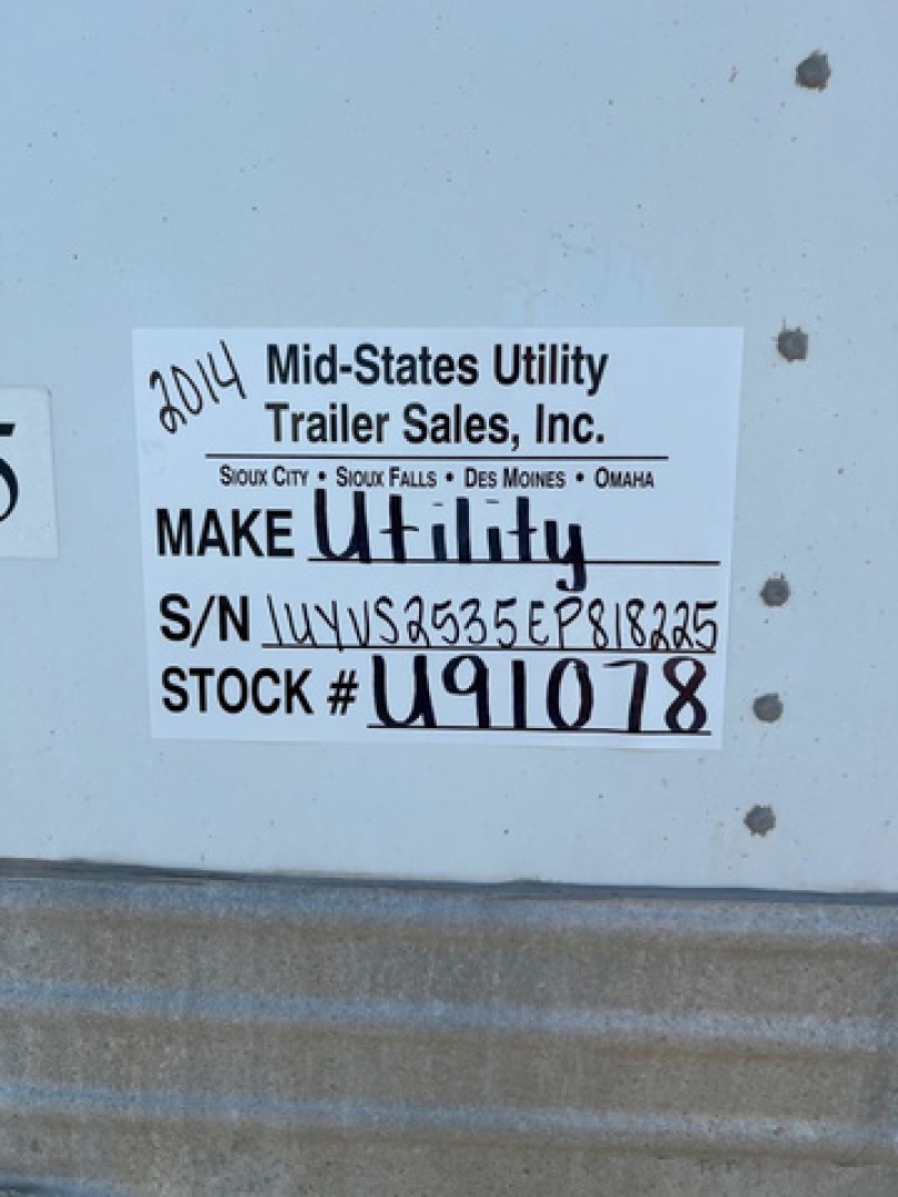 Sticker on trailer showing 'Mid-States Utility Trailer Sales, Inc.' with S/N and STOCK # U91078; makes 'Utility' handwritten; 2014.