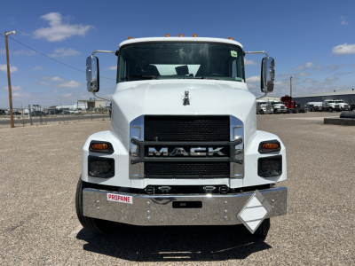Front view of a white 2026 Mack MD7 truck with chrome bumper and grille, large side mirrors, and stock number 69904.