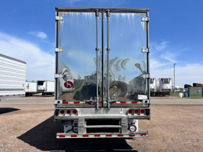 Great Dane reefer trailer back view showing reflective insulated doors and rear bumper with lights