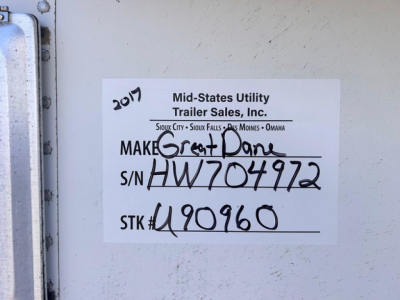 Trailer side with label showing 2017 Great Dane reefer, VIN 1GRAA0626HW704972, stock U90960, label from Mid-States Utility Trailer Sales with S/N HW704972 and STK 490960.