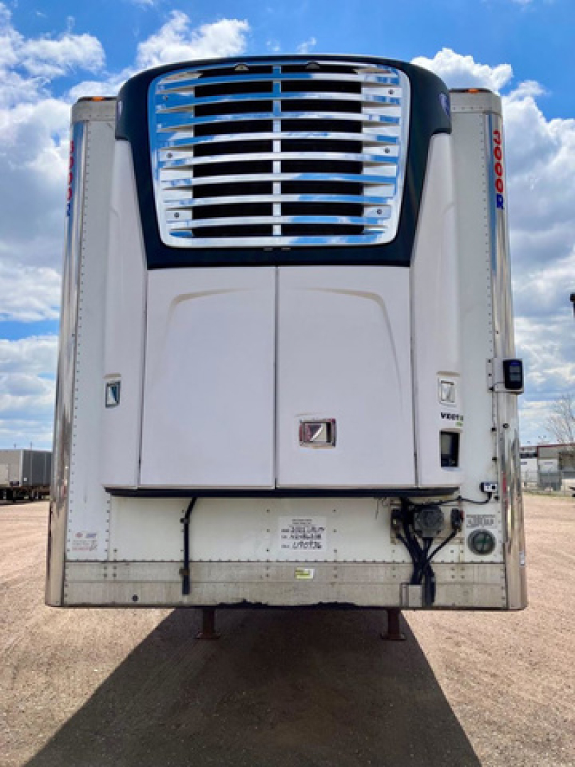 Reefer trailer front view showing large white refrigeration unit with chrome grille, '3000R' vertical text on right edge, and lower service panel.