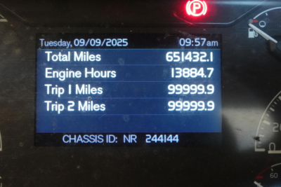 Truck instrument display showing Total Miles 651432.1, Engine Hours 13884.7, Trip 1 Miles 99999.9, Trip 2 Miles 99999.9, date Tuesday, 09/09/2025, CHASSIS ID NR 244144.