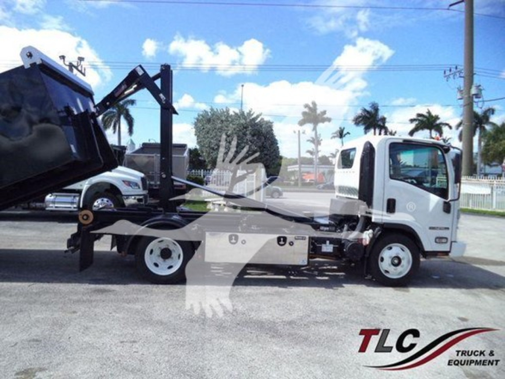 Isuzu NPR-HD tow truck with hooklift in side view showing chassis, cab, and hydraulic arm.