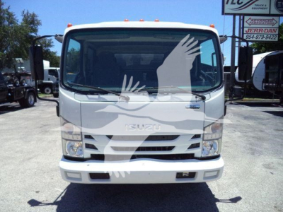 Isuzu NPR HD dump truck front view showing grille and bumper with Isuzu badge and headlights.