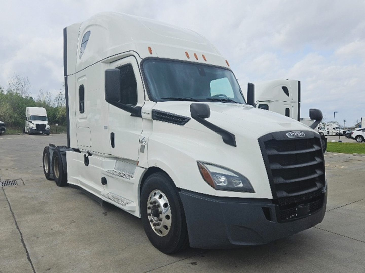 Truck image showing a white 2020 Freightliner Cascadia126 sleeper cab with black grille and mirrors, VIN tag area not visible.