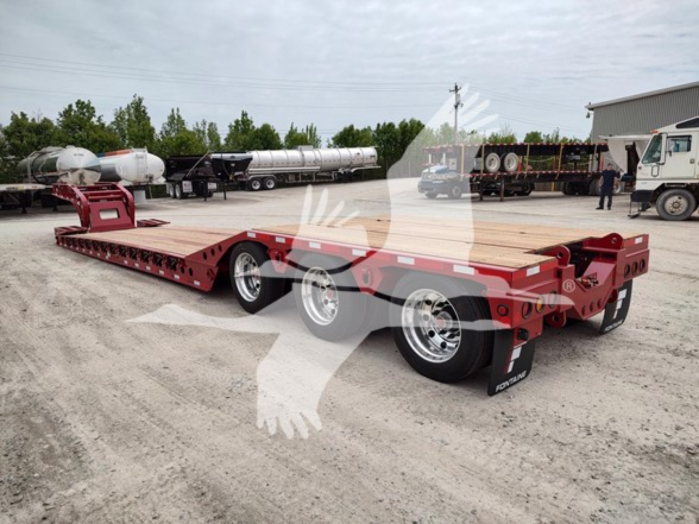  Fontaine Paver Pro trailer lowboy showing red multi-axle deck with three axles and surface details.