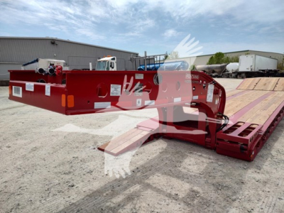 Lowboy trailer side view showing red Fontaine Paver Pro equipment with long flatbed and gooseneck, VIN 13NE53303V35A6665 and stock V35A6665.