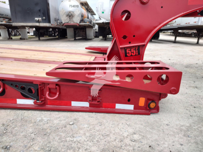 Fontaine paver trailer component with red frame showing around 75-inch offset and structural channels; visible labels include '7550' and cutouts for mounting.