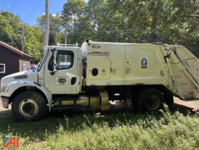Freightliner M2 106 medium duty garbage truck side view showing white cab and rear-compartment refuse body with logos and decals.
