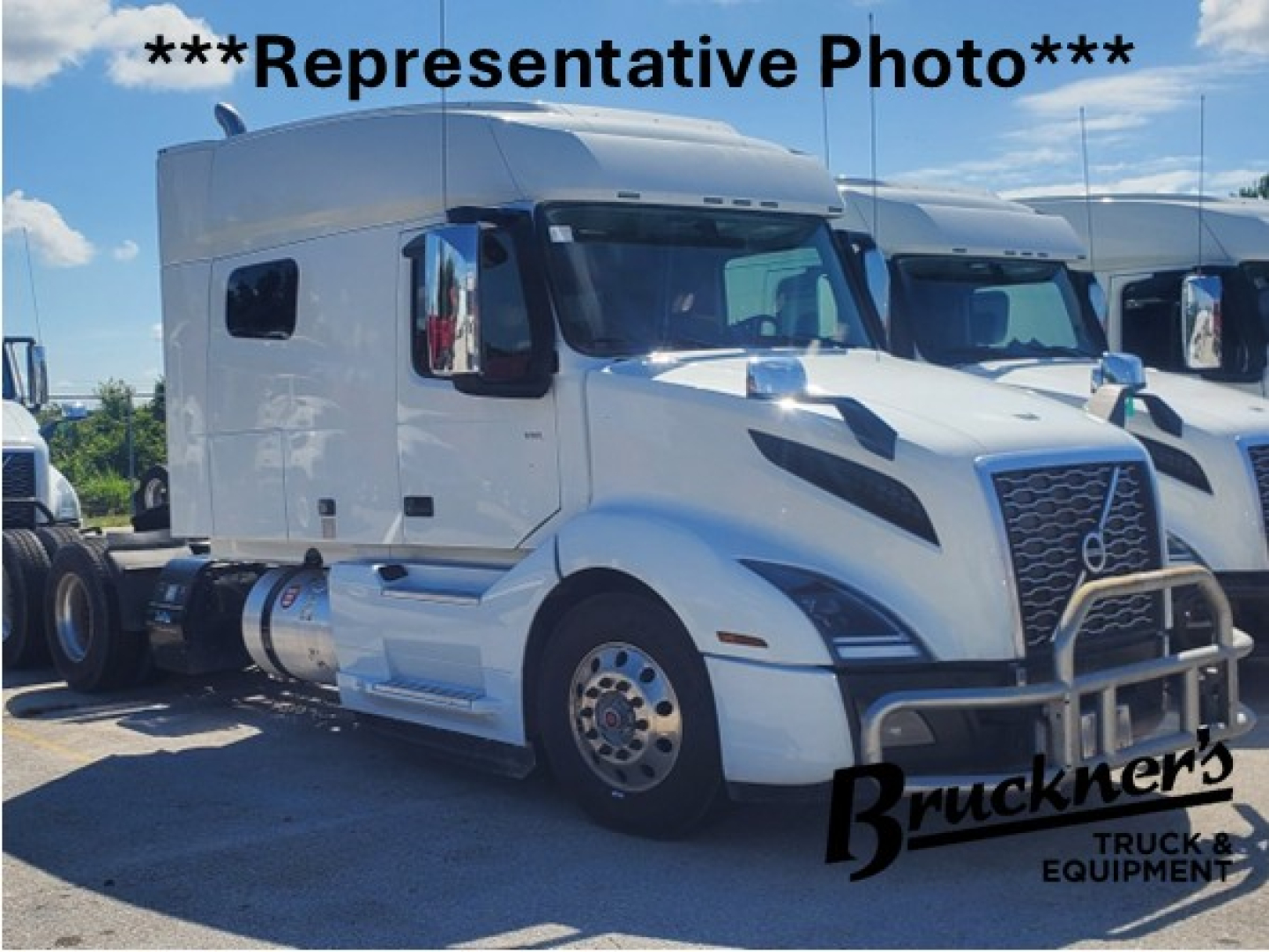 Volvo VNL64T740 sleeper cab tractor truck in white, with grille guard and chrome bumper; text overlay ***Representative Photo*** on top and Bruckners Truck & Equipment logo bottom right.