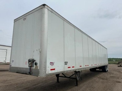  Trailer van showing a white 53' Wabash semi trailer with front nose, side doors, landing gear, and rear wheels visible.