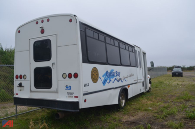2009 International 3200 bus rear and side view with logos and windows