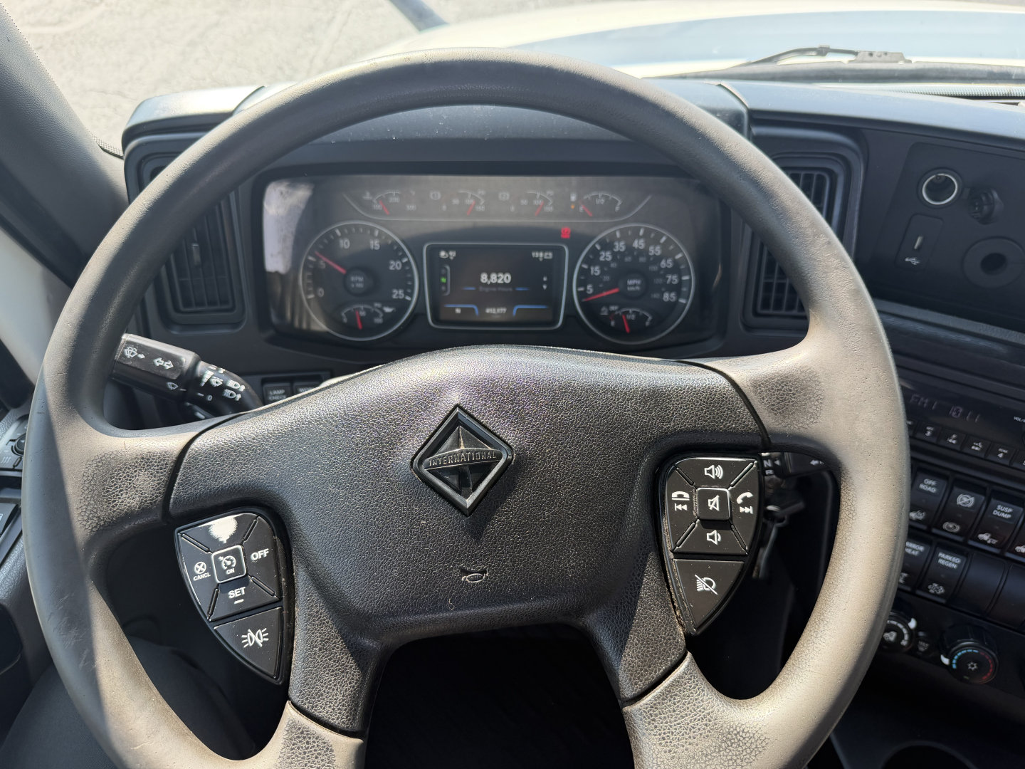 Truck cab dashboard and steering wheel with dashboard gauges. Visible text includes 'LT625' on listing title, 'VIN: 3HSDZAPR5NN411403' and 'Stock Number: 0629200' from context, no additional legible text on labels in image.