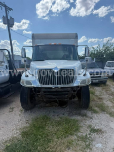 Front view of a white 2005 International 4400 box truck showing grille, headlights, front bumper, and cargo area roof crown. VIN and stock not visible in image.