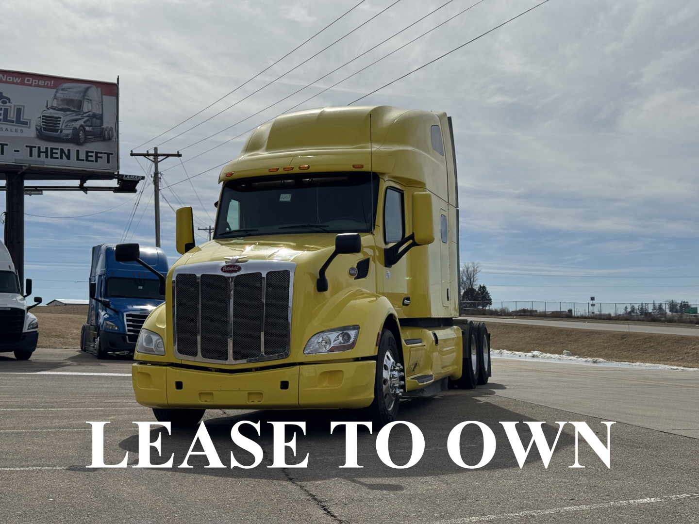 Peterbilt 579 conventional sleeper truck in yellow, front view, showing ’LEASE TO OWN’ text overlay.
