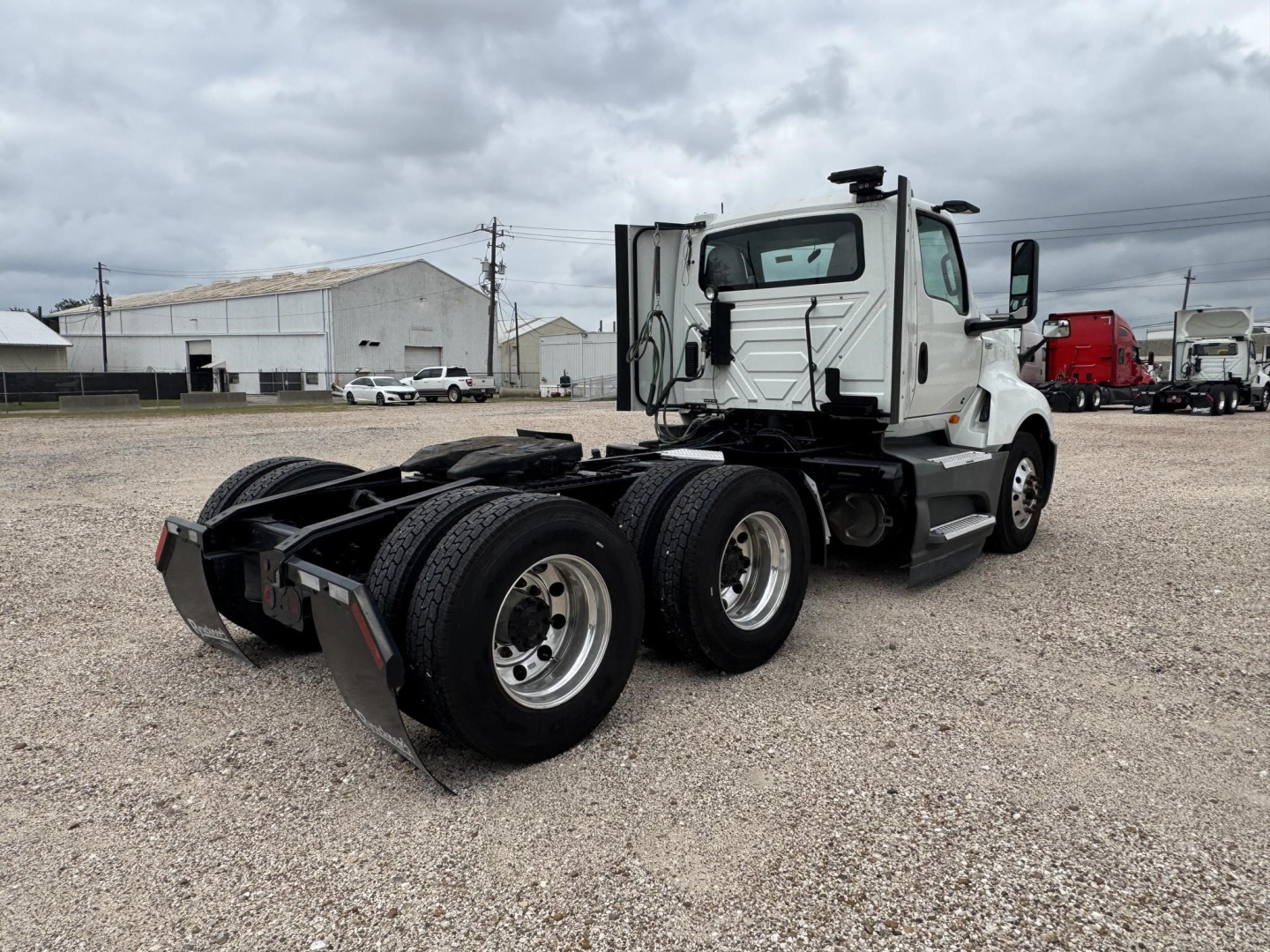 Truck chassis and rear view of a 2021 International LT Daycab showing dual rear axles and hitch area.
