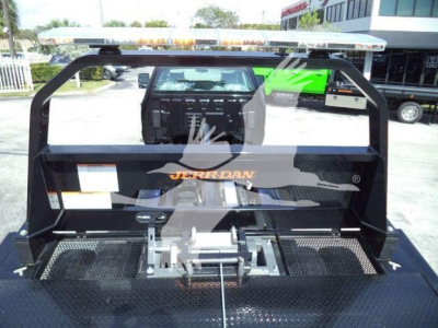 Back view of a truck rollback bed with JERR-DAN branding and a hydraulic winch in the center.