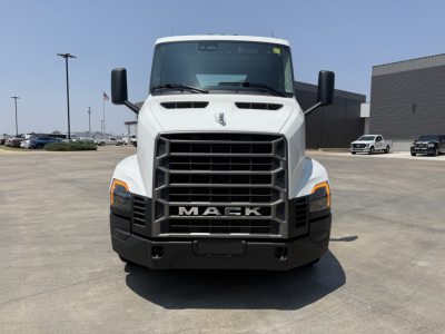 Truck front view of a white 2027 Mack AN64T conventional daycab with black grille, headlights, and large Mack logo.