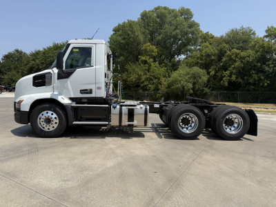 Mack AN64T conventional daycab truck side view showing cab, chassis, and dual rear axles.