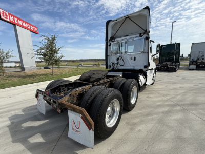  Freightliner PT126064S T cab and rear chassis showing dual rear axles and exposed drivetrain.