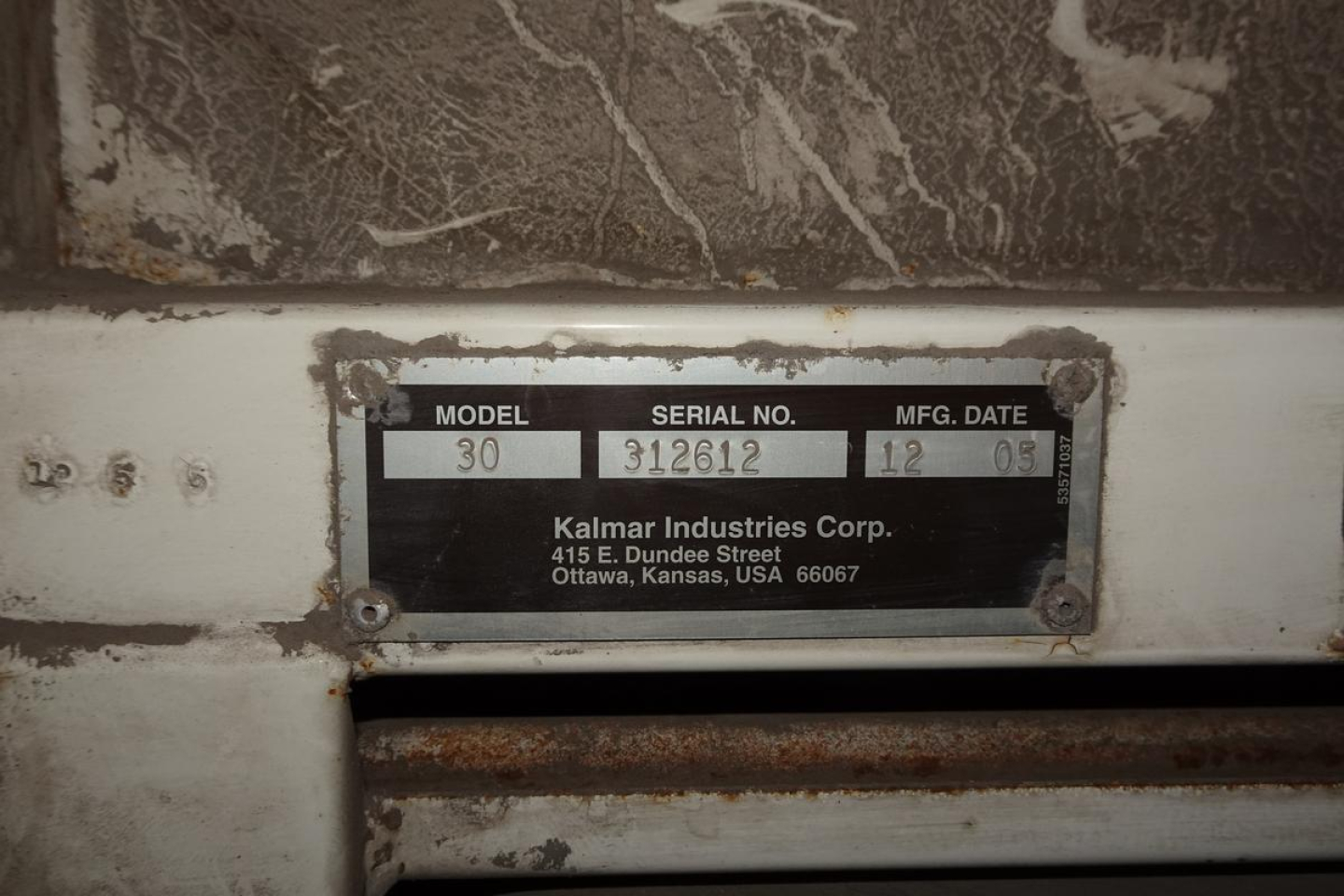 Model plate on equipment showing model 30, serial number 312612, Meg date 12 03, Kalmar Industries Corp., 415 E. Dundee Street, Ottawa, Kansas, USA 66067.