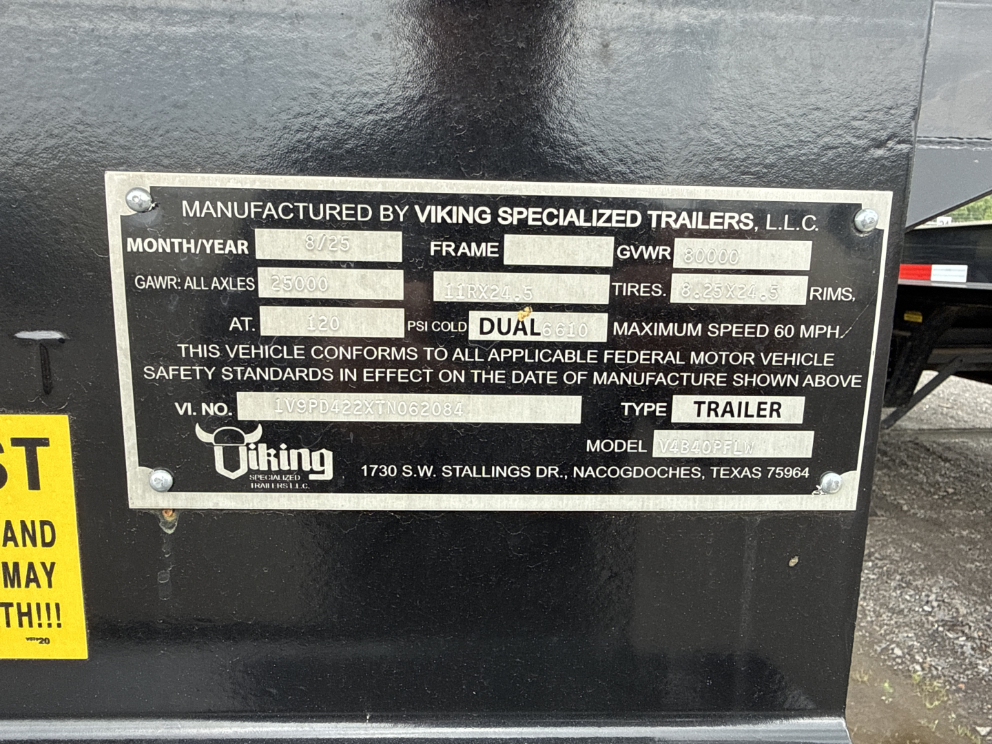 Manuf plaque on Viking specialized trailers showing VIN, stock, frame, GVWR, GAWR, tires, and safety standards. Text includes "MANUFACTURED BY VIKING SPECIALIZED TRAILERS, L.L.C." plus model, type: TRAILER and logo Viking, address 1730 S.W.
