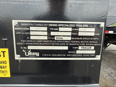 Manuf plaque on Viking specialized trailers showing VIN, stock, frame, GVWR, GAWR, tires, and safety standards. Text includes "MANUFACTURED BY VIKING SPECIALIZED TRAILERS, L.L.C." plus model, type: TRAILER and logo Viking, address 1730 S.W.
