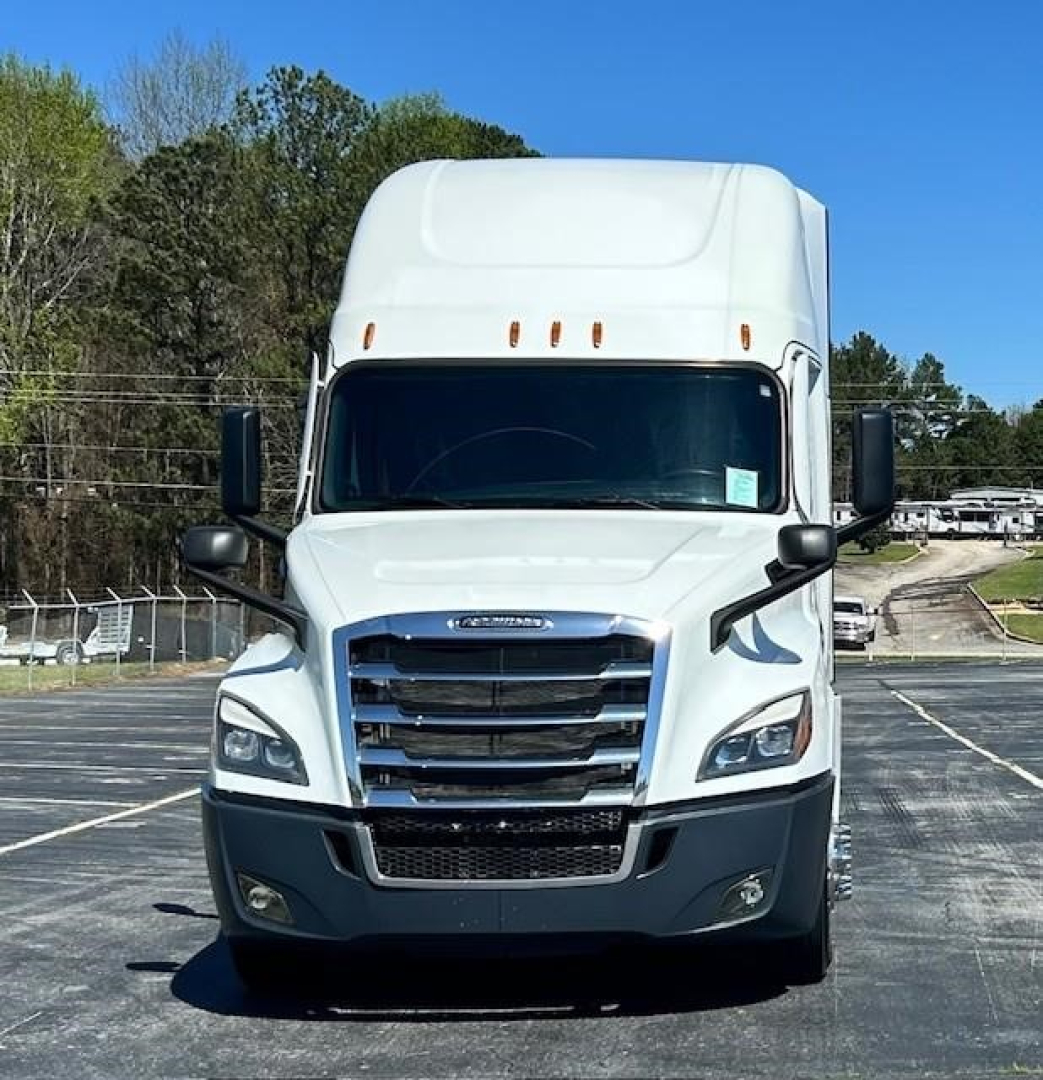Freightliner Cascadia 126 truck front view showing large grille, headlights, and side mirrors