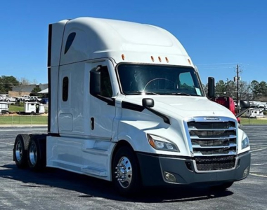 Freightliner Cascadia 126 truck in white, front-right view showing sleeper cab, chrome grille, headlights, and dual rear axles.