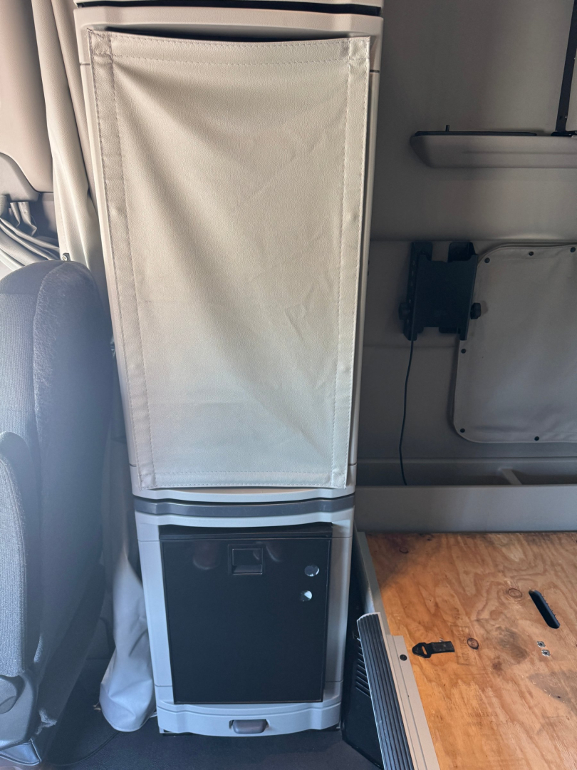 Peterbilt 579 cab interior showing storage cabinet and wood floor panel