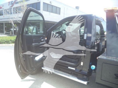 Ram 5500 SLT crew cab interior with open front door and side step visible.