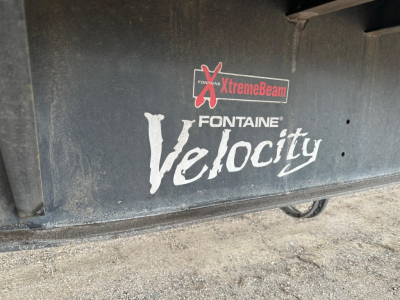Fontaine Velocity logo on trailer showing Xtremebeam branding and velocity text.