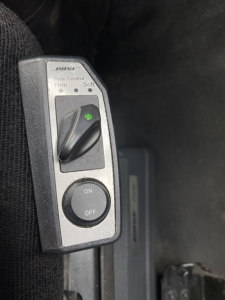 Peterbilt 579 interior throttle control switch panel with ride control firmness selector and ON/OFF switch.