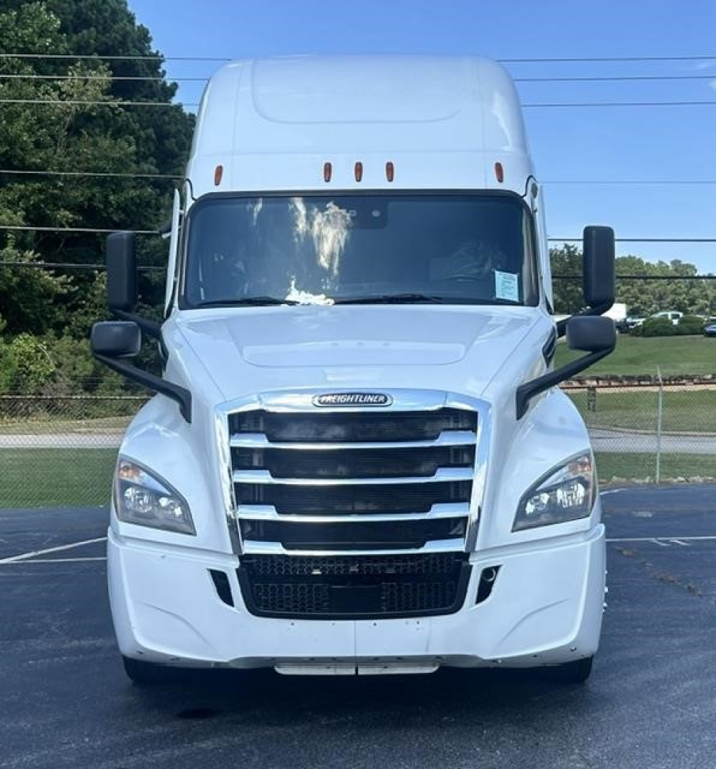 Freightliner Cascadia 126 truck front view showing grille, headlights, and large side mirrors.