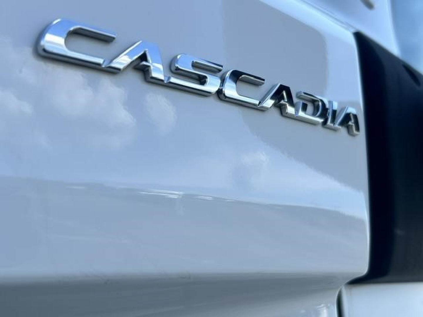 Freightliner Cascadia badge on exterior of truck door highlighting model Cascadia 126.