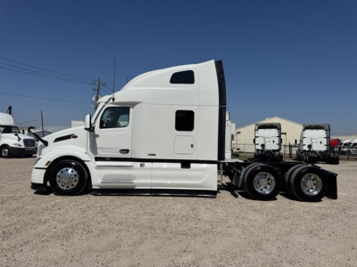 Peterbilt 579 conventional sleeper truck side view showing 6x4 axle configuration, white cab, extended sleeper, dual rear wheels, VIN 1XPBD49X3RD638140 visible on listing page.