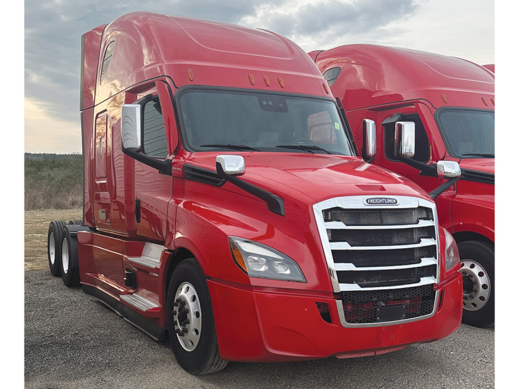 Red Freightliner Cascadia126 semi-truck tractor front and side view with chrome grille, large headlights, and black side mirrors.