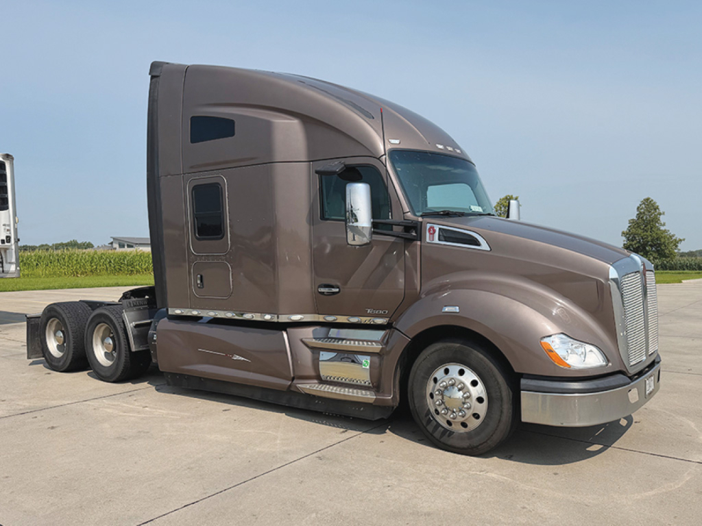 Kenworth T-680 truck side view with sleeper cab and chrome accents