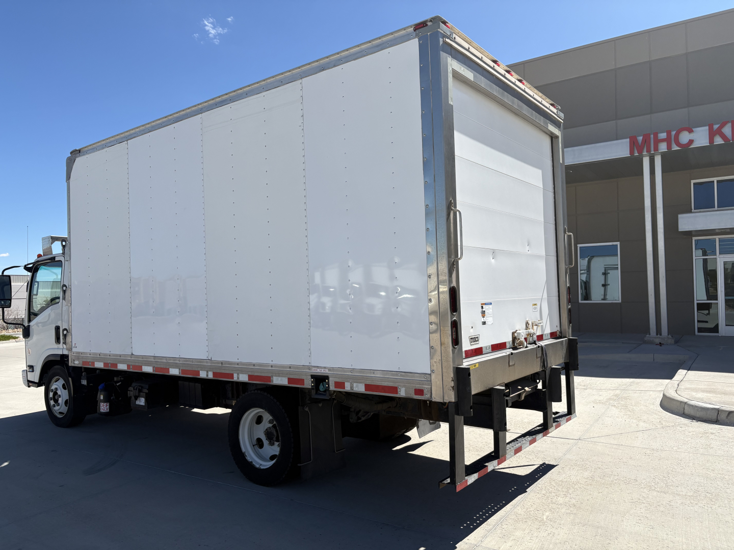 Chevrolet W4500 box truck rear-right angle showing refrigerated cargo box and rear doors.
