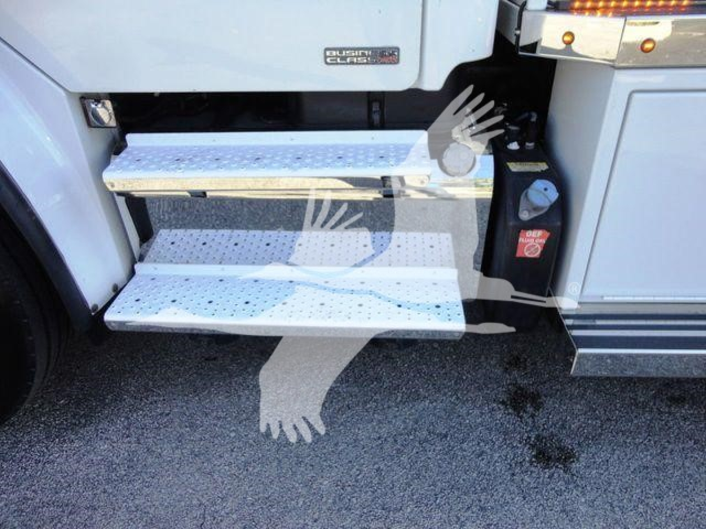 Freightliner Business Class M2 106 side steps with entry step and chrome tread plates visible.