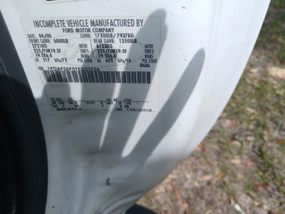 Ford incomplete vehicle label showing VIN 1FDAF56F5YED33526, GVWR 13,500LB, Front GAWR 6,000LB, Rear GAWR 7,000LB, dual rear wheels, tire info, and manufacture data.