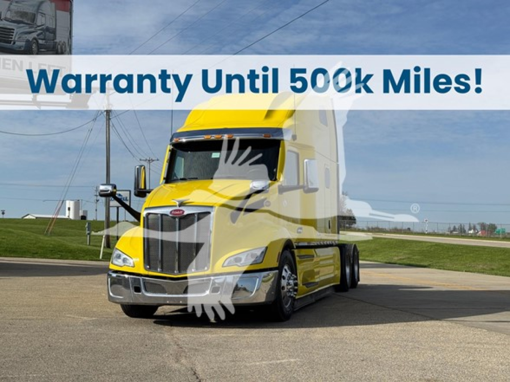 Peterbilt 579 conventional sleeper truck in yellow, front view, with promo banner "Warranty Until 500k Miles!" overlay.