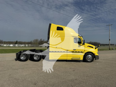 Peterbilt 579 truck in yellow showing side profile with sleeper cab and cab: 2024 Peterbilt 579.